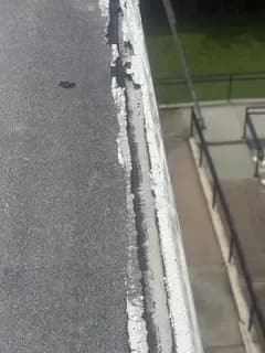 Worn perimeter edge before repair